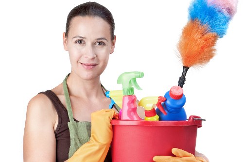 Commercial cleaners working in a Finsbury Park office reception area