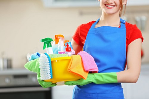 Detailed cleaning of office desks and shared surfaces in a Finsbury Park workplace